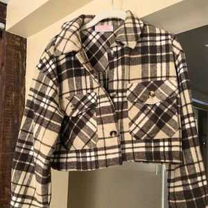 This is a cropped lightweight flannel jacket/shirt. Super soft never worn.